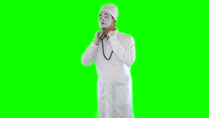 Stock Video Mime Imitates Doctor With Stethoscope On Green Scree Animated Wallpaper