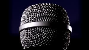 Stock Video Microphone Rotating On A Black Backgroun Animated Wallpaper