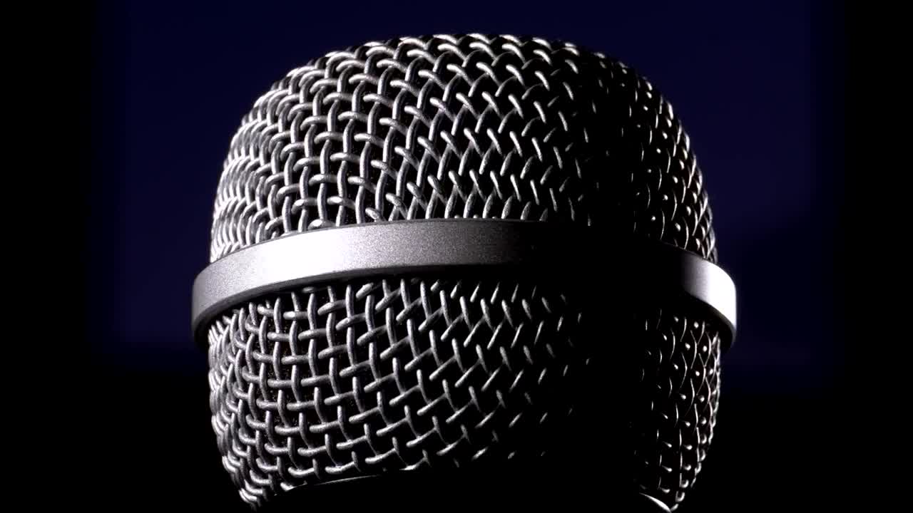 Download Stock Video Microphone Rotating On A Black Backgroun Animated Wallpaper