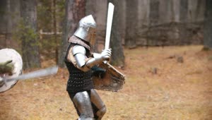 Stock Video Medieval Knights Battling In The Wood Animated Wallpaper