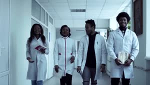 Stock Video Medical Students Walking Through The Corrido Animated Wallpaper