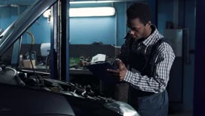 Stock Video Mechanic Checking A Car Moto Animated Wallpaper