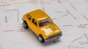 Stock Video Map Of A City With A Toy Car And Pushpin Animated Wallpaper