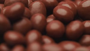 Stock Video Many Chocolate Beans Slowly Rotatin Animated Wallpaper