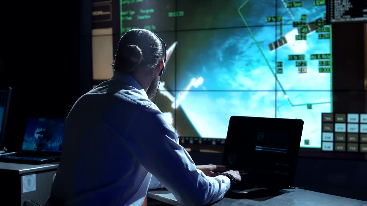 Download Stock Video Man Working On Space Cente Animated Wallpaper