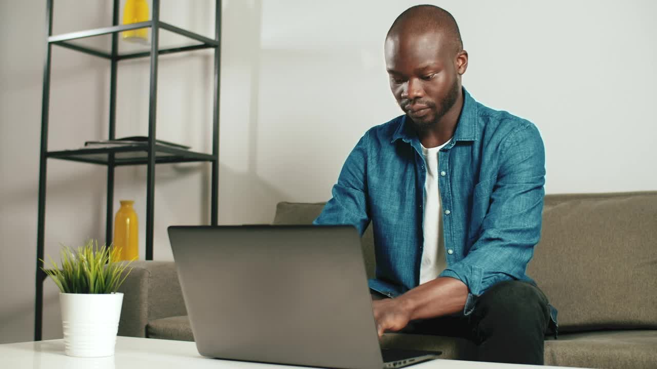 Download Stock Video Man Working On His Laptop Remotel Animated Wallpaper