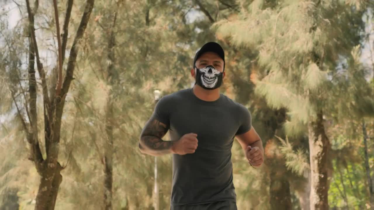 Download Stock Video Man Wearing Face Mask While Joggin Animated Wallpaper