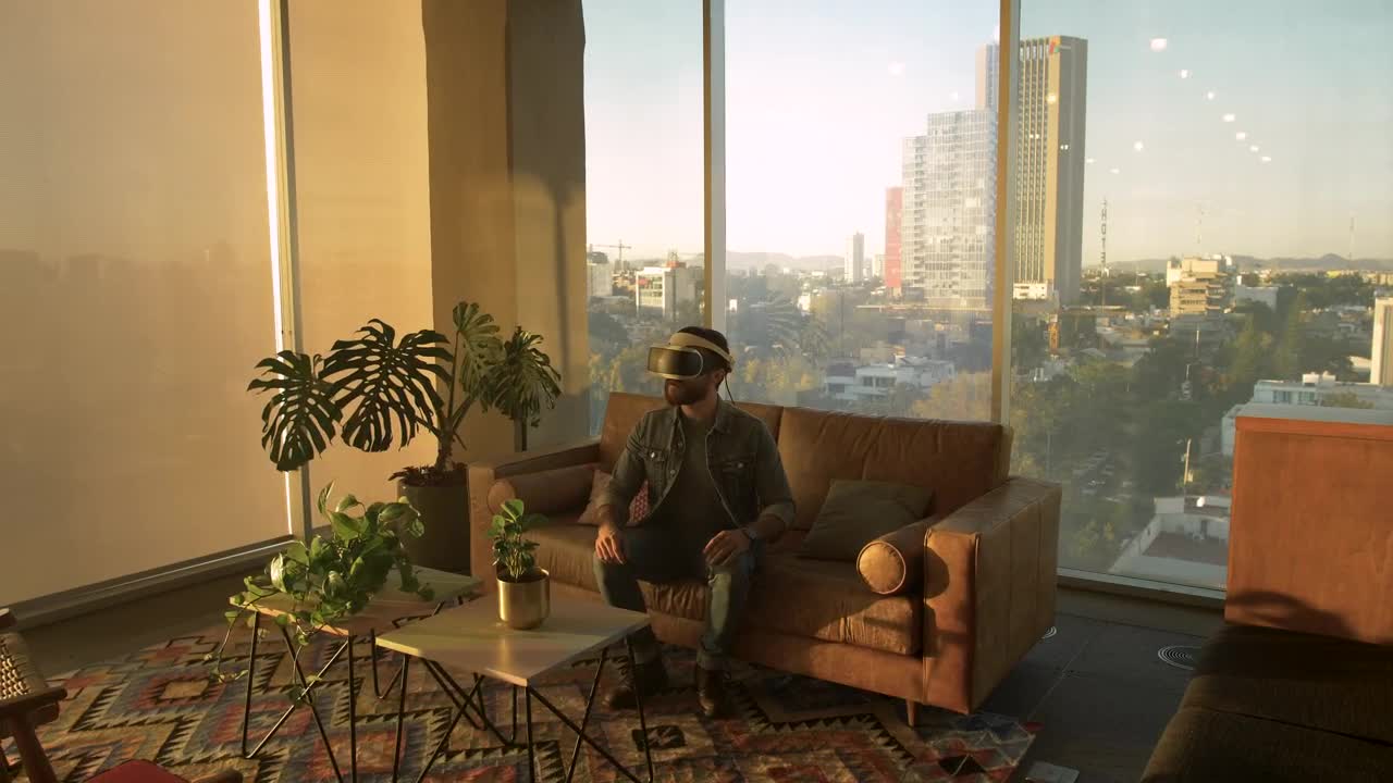 Download Stock Video Man Wearing Augmented Reality Glasses In An Apartmen Animated Wallpaper