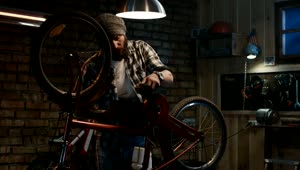 Stock Video Man Watching A Tutorial To Repair A Bik Animated Wallpaper
