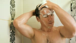Stock Video Man Washing His Hair While Bathin Animated Wallpaper