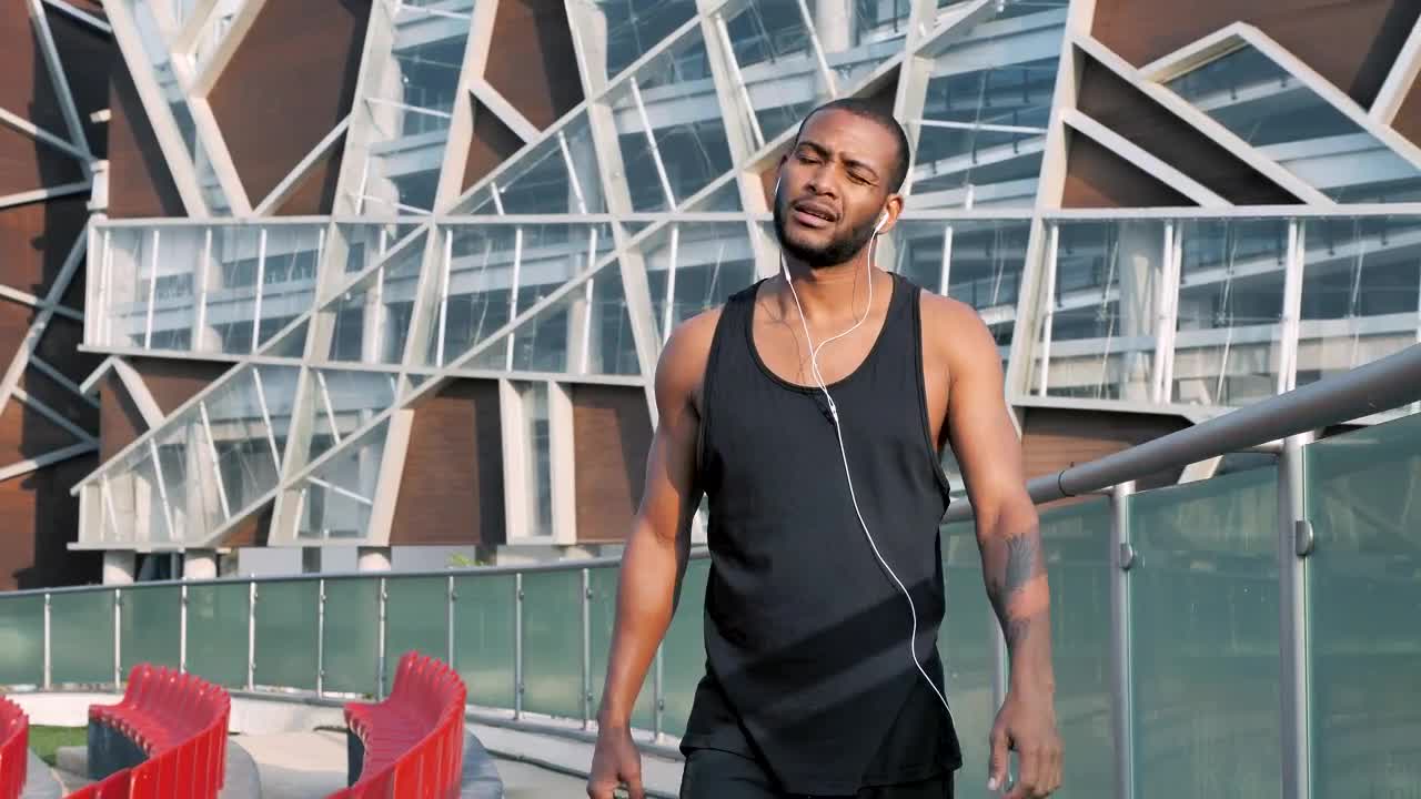 Download Stock Video Man Walking Wearing Activewea Animated Wallpaper