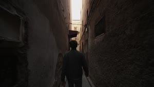 Stock Video Man Walking Through The Narrow Streets Of Morocc Animated Wallpaper