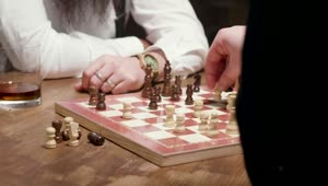 Stock Video Man Thinking About Next Chess Move Gets Checkmat Animated Wallpaper