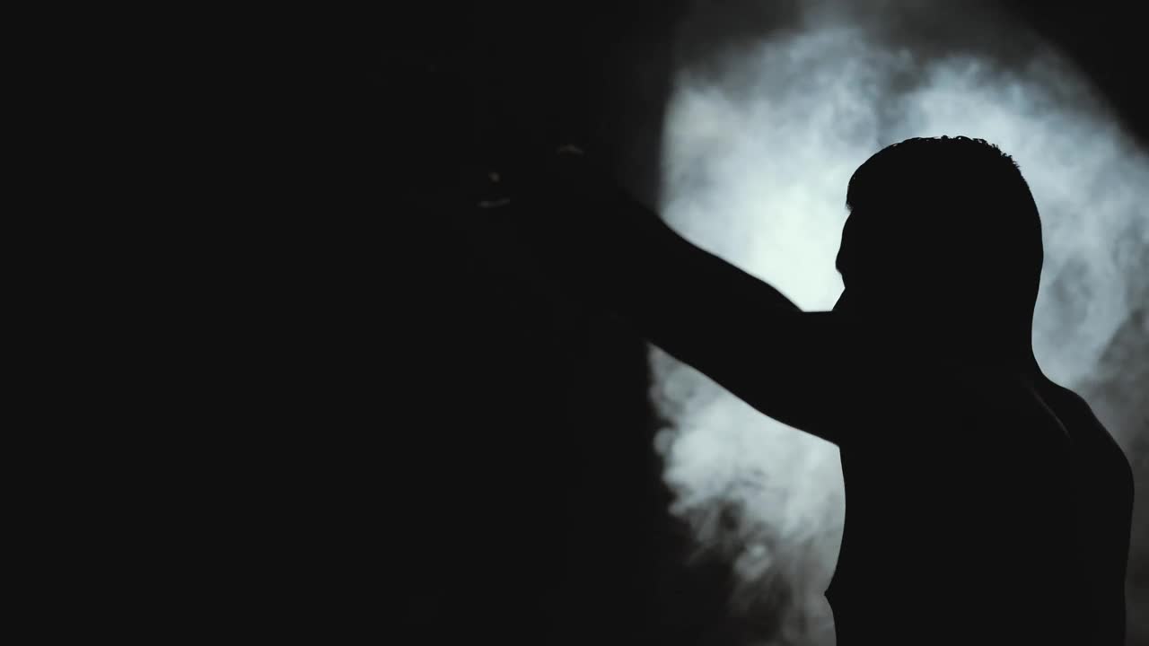 Download Stock Video Man Stretching In The Dark And Smok Animated Wallpaper