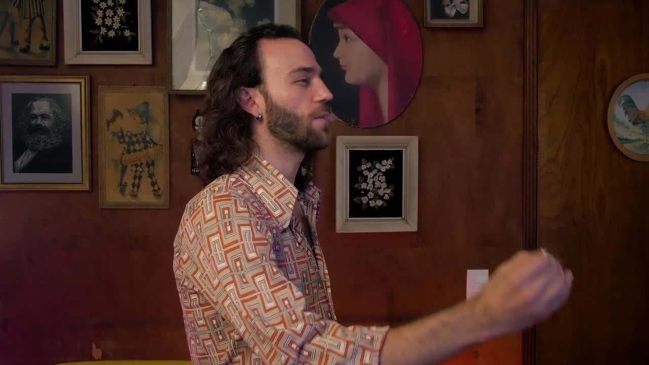 Download Stock Video Man Smoking A Cigarette And Looking At The Camer Animated Wallpaper