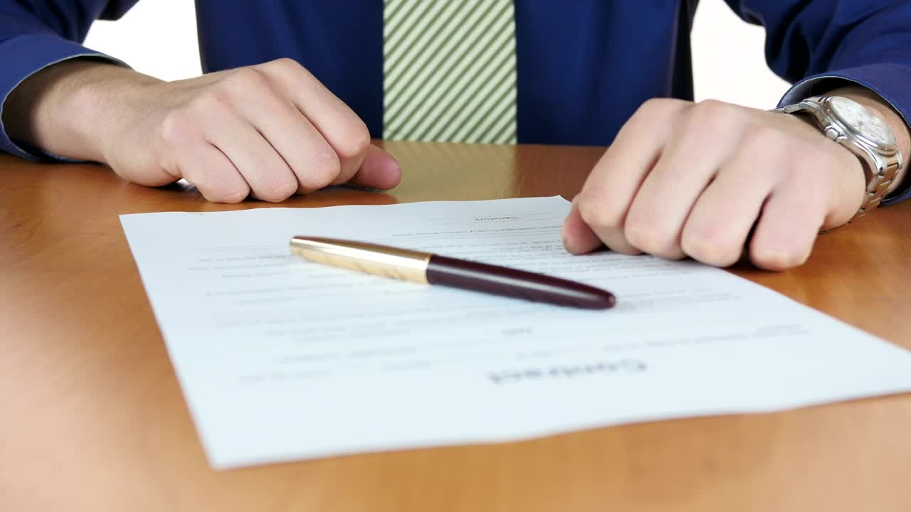 Download Stock Video Man Signing A Contract With Pe Animated Wallpaper