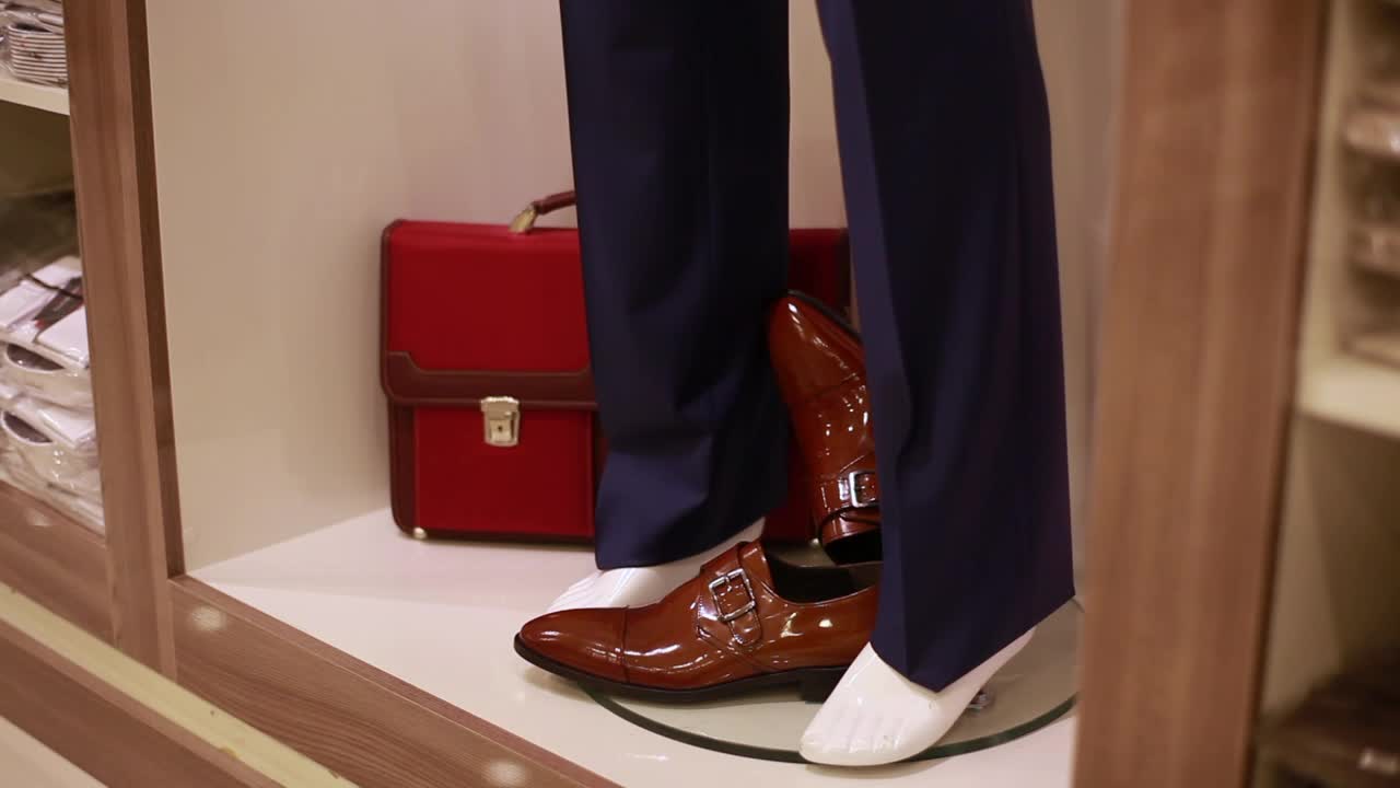 Download Stock Video Man Shopping Shoes At A Stor Animated Wallpaper