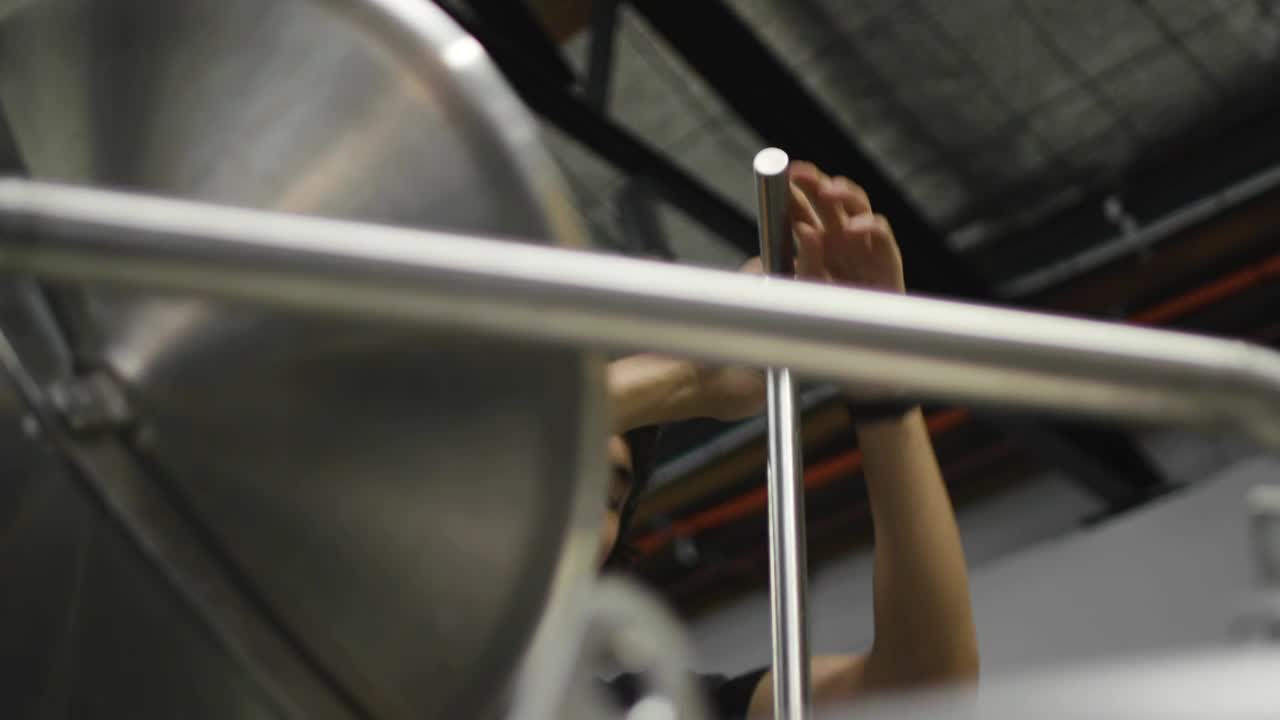 Download Stock Video Man Shifting Ground Barley In A Tan Animated Wallpaper