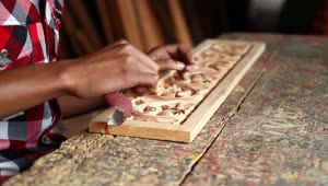 Stock Video Man Sanding A Wooden Carvin Animated Wallpaper
