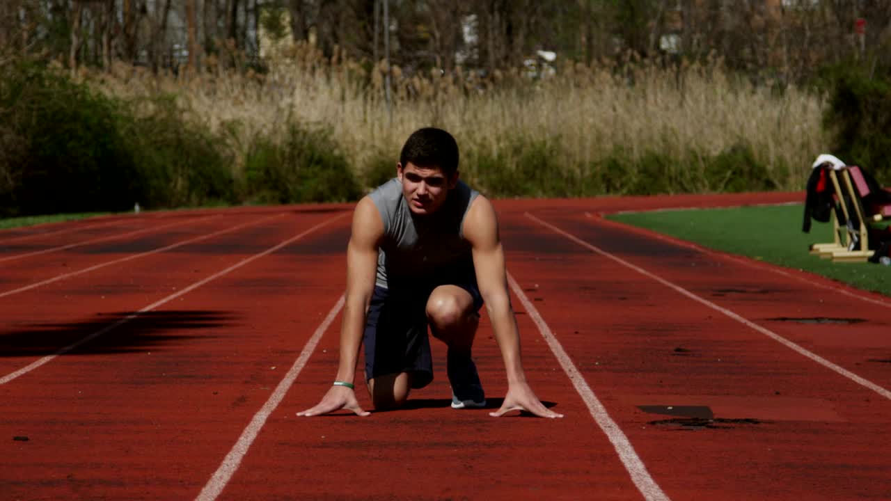 Download Stock Video Man Running Down A Trac Animated Wallpaper