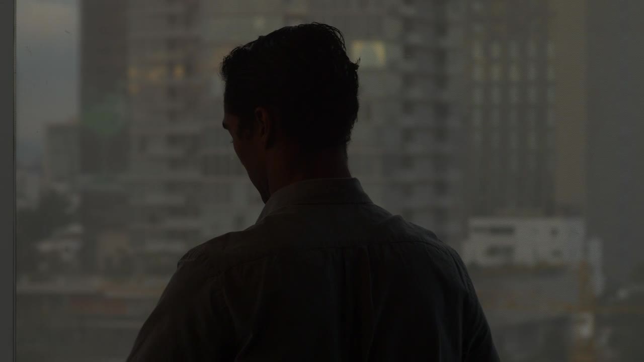 Download Stock Video Man Putting On A Jacke Animated Wallpaper