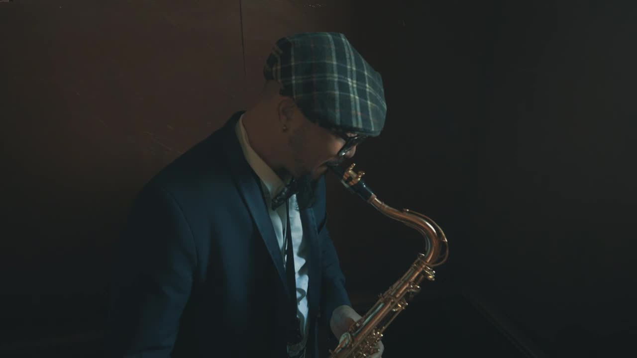 Download Stock Video Man Playing The Saxophon Animated Wallpaper