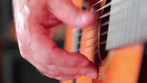 Stock Video Man Playing A Guitar Outsid Animated Wallpaper