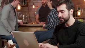 Stock Video Man Pauses To Think While Typing On Laptop In Caf Animated Wallpaper
