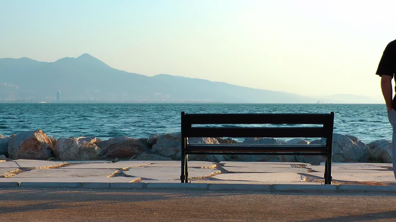 Download Stock Video Man Looking Out To Sea At The Pier From Animated Wallpaper