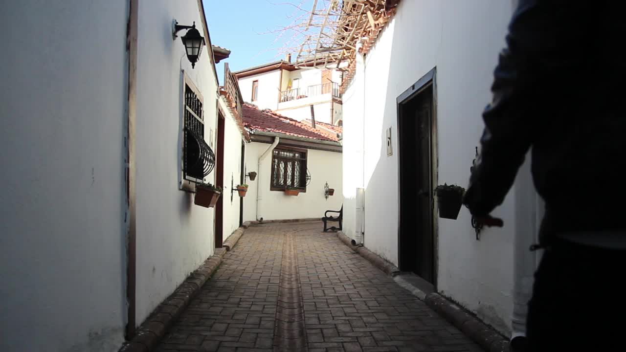 Download Stock Video Man Looking For An Address In An Old Alle Animated Wallpaper