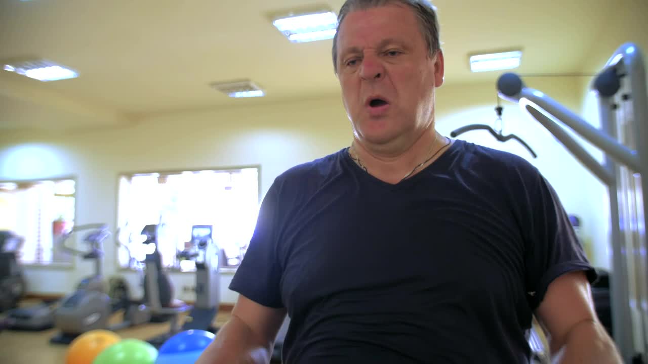 Download Stock Video Man Lifting A Barbel Animated Wallpaper