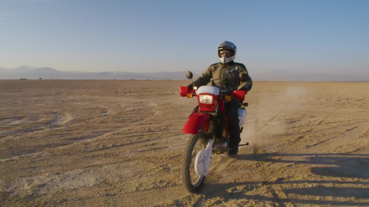 Download Stock Video Motorcyclist Arriving Live Wallpaper