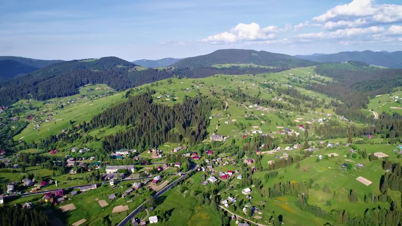 Download Stock Video Mountain Village Seen From The Air At A Sunny Day Live Wallpaper