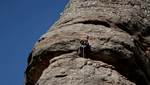 Stock Video Mountaineers Rock Climbing Live Wallpaper