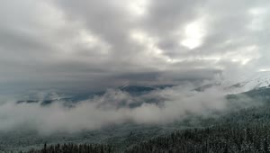 Stock Video Mountainous Landscape In Winter Covered With Fog Live Wallpaper