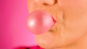 Stock Video Mouth Of A Woman Making A Bubble Gum Live Wallpaper