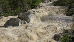 Stock Video Muddy River Rapids And Rocks Live Wallpaper