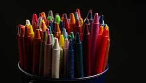 Stock Video Multi Color Wax Crayons On A Black Background Live Wallpaper