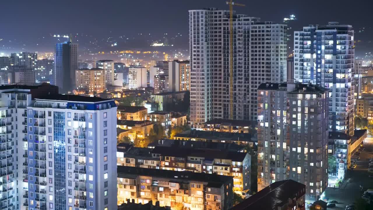 Download Stock Video Multi Story Buildings Time Lapse At Night Live Wallpaper