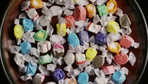 Stock Video Multicolor Candies In A Plate Rotating Live Wallpaper