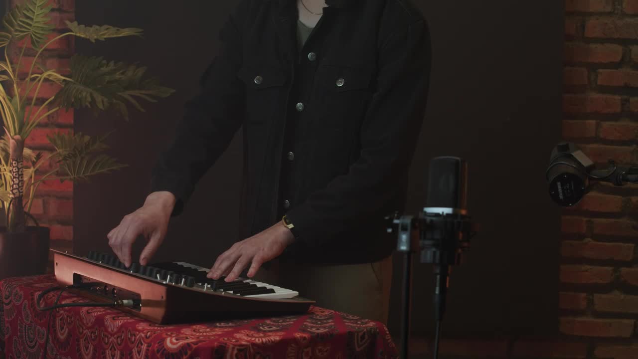 Download Stock Video Musician Playing A Piano Or A Midi Live Wallpaper