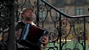 Stock Video Musician Playing Accordion On Steps Live Wallpaper