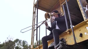 Stock Video Musician Playing His Trombone Alone Live Wallpaper