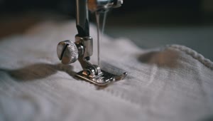Stock Video Needle Sewing In Slow Motion Live Wallpaper