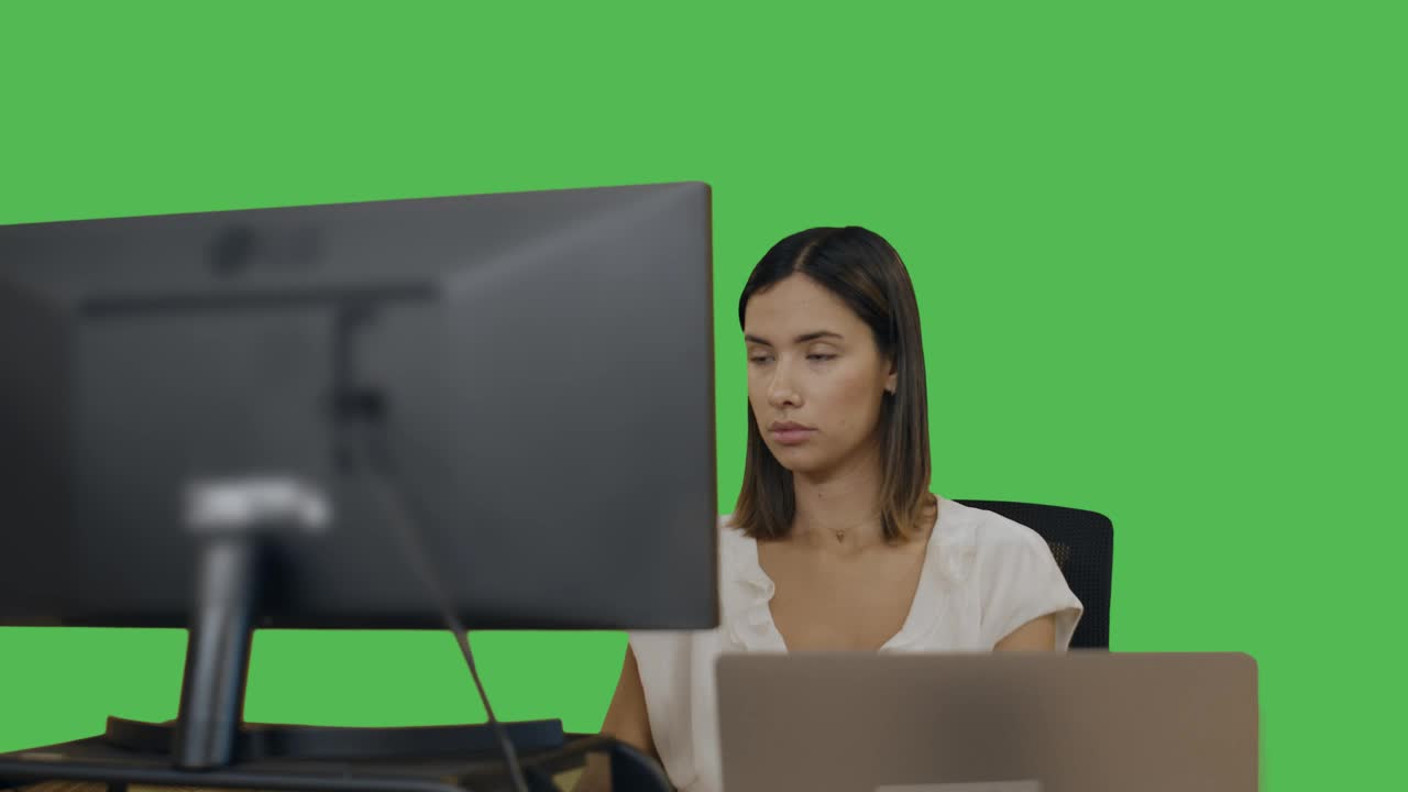 Download Stock Video Office Woman At Her Desk On A Green Background Live Wallpaper