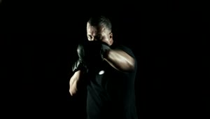 Stock Video Old Boxer Training In A Dark Room Live Wallpaper