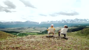 Stock Video Old Couple Looking At The Horizon On A Hill Live Wallpaper