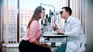 Stock Video Optometrist Checking A Patient Eyes Live Wallpaper