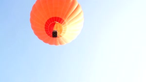 Stock Video Orange Hot Air Balloon Flying Live Wallpaper