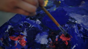 Stock Video Painter Taking Paint From A Palette Live Wallpaper